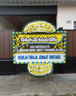 Papan Bunga Duka di Teling Bawah